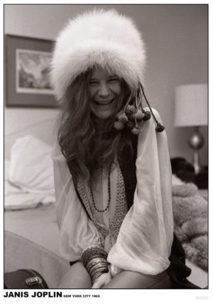 Janis Joplin in a fluffy white hat in New York in 1969