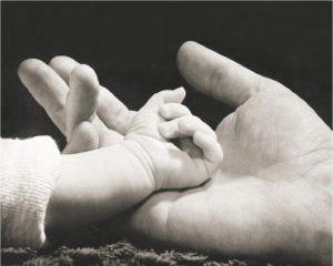 Sarah in Her Dad's Hand Mini Poster