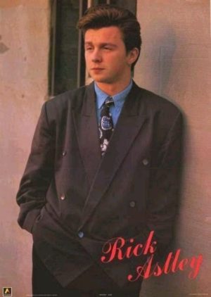rick astley leaning against a wall poster print